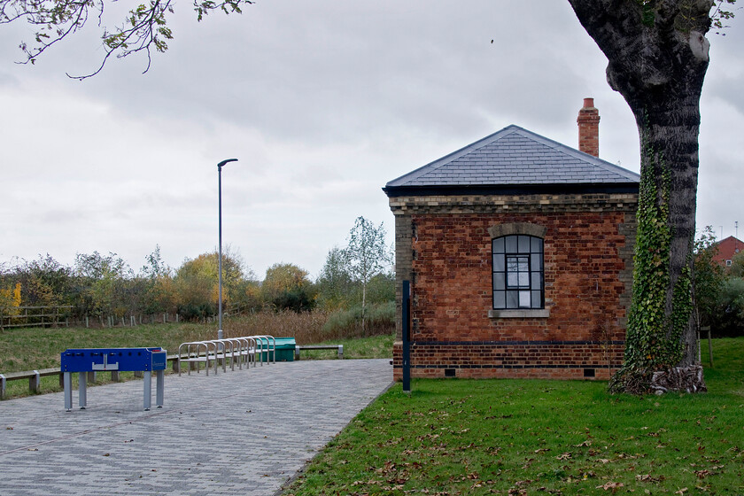 Associated building, The Engine Shed, Students' Union building, UON Riverside campus 
 A small building located just in front of the former Midland Railway engine shed at the University of Northampton's Riverside campus. Like the main building, just behind where I am standing, this has also been carefully restored and is in use by the Students' Union. Also, like the main building, it is constructed by rather expensive, for the era, polychrome brickwork that could well have been regarded as a little extravagant by the shareholders of the Midland Railway! 
 Keywords: Associated building The Engine Shed Students' Union building UON Riverside campus