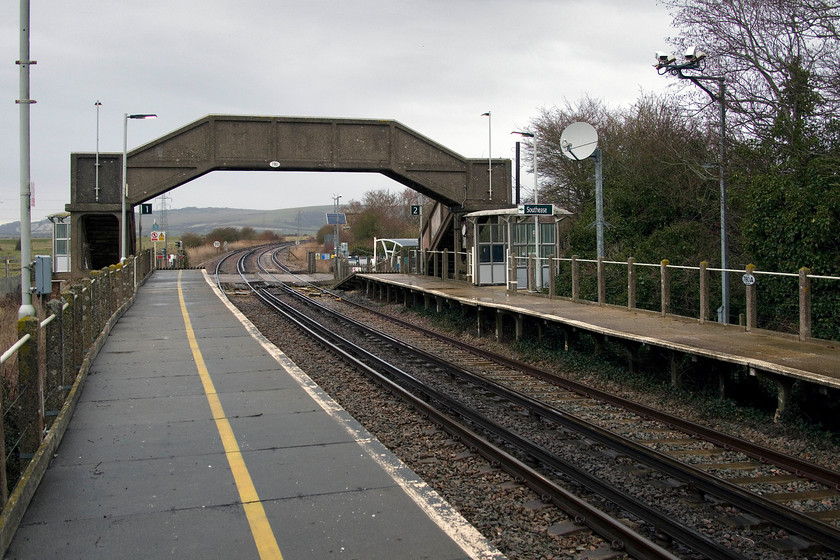 Southease station 
 Virtually all of the structure and parts of Southease station from the railing posts to the footbridge would have been a product of the Southern's concrete works at Exeter. They pre-fabricated many of their structures and much remains in use today. Situated at a remote spot in the Ouse Valley, on the Lewis to Seaford branch, it has a surprisingly high number of customers nearing 20 000 last year. I suspect that most are walkers and cyclists using the station as part of an outing on the South Downs Way that crosses the line at the end of the platforms over the level crossing. 
 Keywords: Southease station