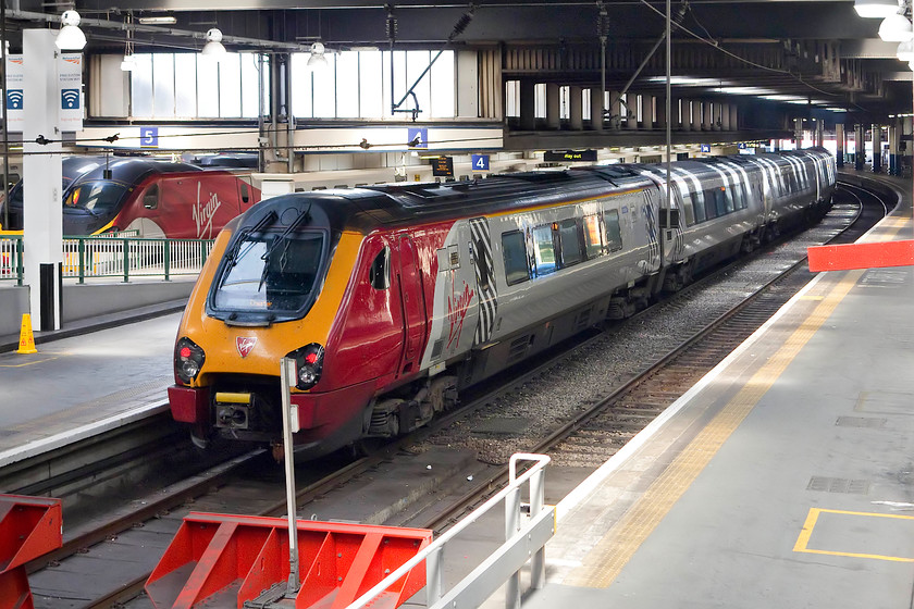 Class 221, VT 11.10 London Euston-Chester (1D85, RT), London Euston 
 A class 221 stands in platform four at Euston waiting to work the 11.10 to Chester. When the much anticipated complete re-build of Euston finally happens, I wonder what scenes will present themselves? 
 Keywords: Class 221 1D85 London Euston