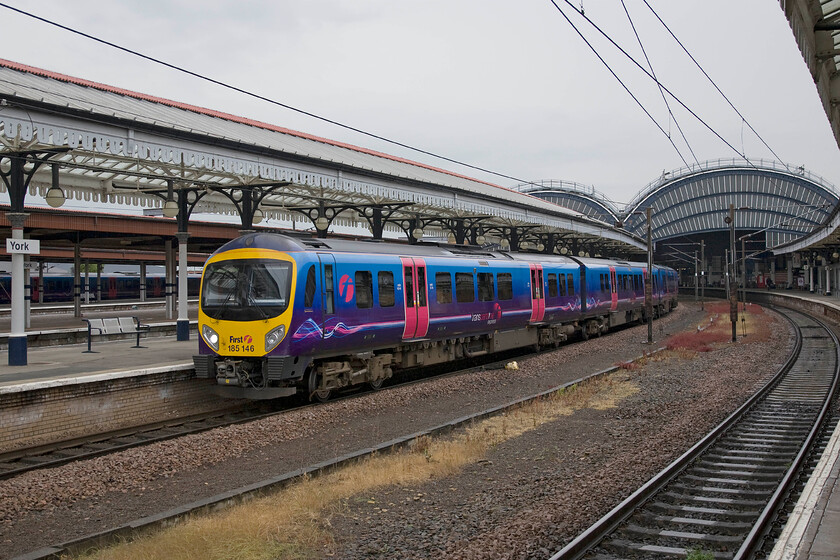 185146, TP 08.53 York-Manchester Airport (1P21), York station 
 TransPennine Express' 185146 waits at the southern end of platform five to work the 08.53 to Manchester Airport. As can be seen in this photograph, another day of leaden skies and rain that characterised our week away! 
 Keywords: 185146 08.53 York-Manchester Airport 1P21 York station TransPennine Express