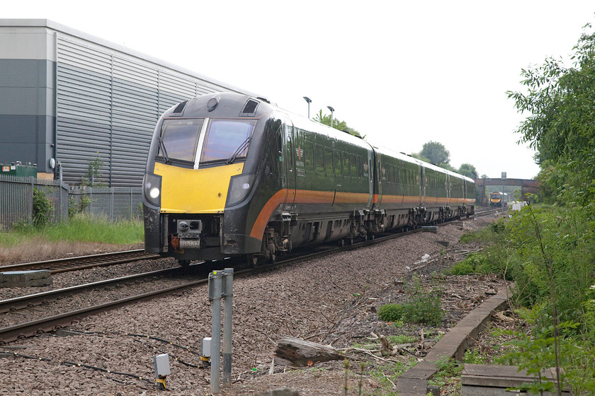 180107, GC 11.21 London Kings Cross-Sunderland (1N92), Low Gates level crossing 
 180107 accelerates away from Northallerton station and the ECML as it works the 1N92 11.21 King's Cross to Sunderland. It is about to cross Low Gates level crossing where the busy A167 road crosses the line. Indeed, as the TPE service had just passed, it can be seen in the distance, the gates had been down for some time and a heck of queue of traffic had built up. 
 Keywords: 180107 11.21 London Kings Cross-Sunderland 1N92 Low Gates level crossing