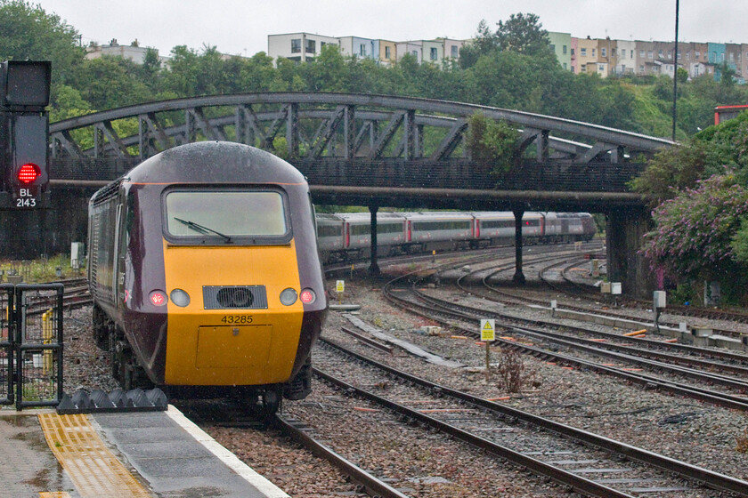 43285 & 43301, XC 06.12 Leeds-Plymouth (1V44, 4L), Bristol Temple Meads station 
 Having brought Andy and me down from Birmingham the 1V44 06.12 Leeds to Plymouth worked by 43285 and 43301 leaves Bristol Temple Meads. The train is passing under Bath Road bridge which gave its name to the once-busy diesel depot. The brightly painted houses on the skyline are in the area of Totterdown. This was once a grim and run-down part of Bristol but has, in more recent years, acquired a more chic and up-coming reputation to the point of being named 'fifth hippest place to live in the UK' by the Times newspaper in 2016. 
 Keywords: 43285 43301 06.12 Leeds-Plymouth 1V44 Bristol Temple Meads station CrossCountry HST