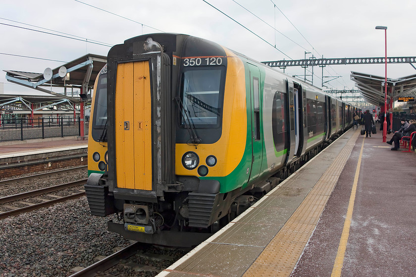 350120, LM 07.54 London Euston-Birmingham New Street (2Y17), Rugby station 
 A cold and grey morning finds 350120 at Rugby station. This was our first train of the journey to Knaresborough, the 07.54 Euston to Birmingham New Street that we took from Northampton. 
 Keywords: 350120 07.54 London Euston-Birmingham New Street 2Y17 Rugby station