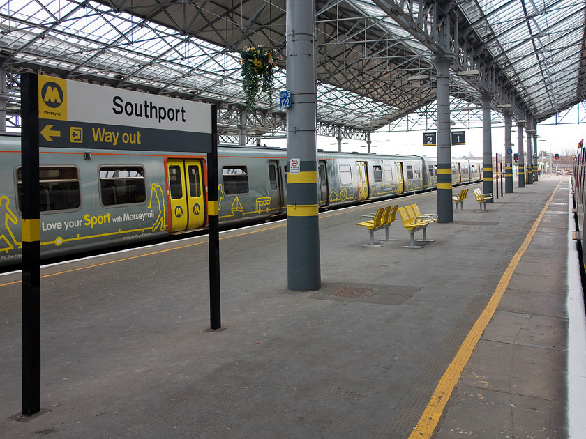 507009, MR 14.58 Southport-Hunts Cross (2U38) & 507027, MR 15.23 Southport-Hunts-Cross (2U38), Southport station 
 Southport station was extensively refurbished in 2006 and 2007 that cost a whopping 3.6million. However, the station remains a pleasant, airy and clean place to be that handles over four million passenger per year. Taken from the open door of 507009 waiting to leave with the 14.58 to Hunt's Cross, 507027 is on the adjacent platform. This unit will work the following 15.23 also to Hunt's Cross. 
 Keywords: 507009 14.58 Southport-Hunt's Cross 2U38 507027 15.23 Southport-Hunt's-Cross 2U38 Southport station