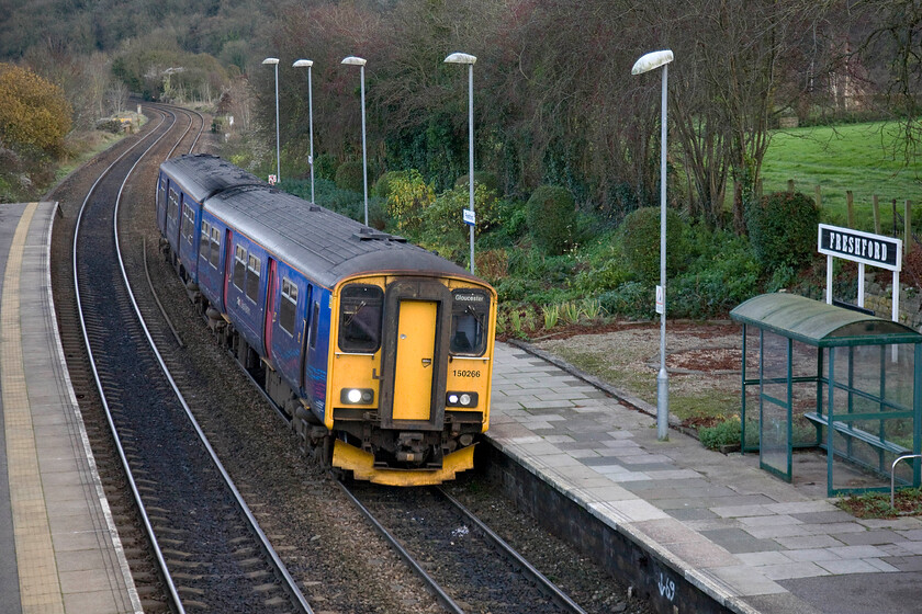 150266, GW 13.10 Weymouth-Gloucester (2E24), Freshford station 
 150266 arrives at Freshford station working the 13.10 Weymouth to Gloucester service. This station is delightfully quiet and rural deep in the beautiful Avon Valley between Bradford-on-Avon and Bath. The village's claim to fame is that it featured in the 1953 film The Titfield Thunderbolt as did a number of other locations in the area including, all be it briefly, Bristol Temple Meads itself. 
 Keywords: 150266 13.10 Weymouth-Gloucester 2E24 Freshford station FGW First Great Western