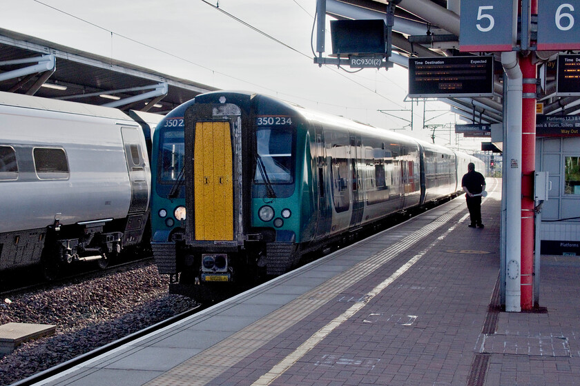 350234, LN 18.53 Birmingham New Street-Northampton (2Y14, 1E), Rugby station 
 London Northwestern's 350234 arrives at Rugby station working the 2Y14 18.53 Birmingham New Street to Northampton station. I would not normally include such a dreadful photograph taken directly into the evening sunshine but its omission would break my rule of having an image of every train that I travel on. Andy and I took this train back home to Northampton as the final leg of our West Midlands Day Ranger.

Journey score 7/10 
 Keywords: 350234 18.53 Birmingham New Street-Northampton 2Y14 Rugby station London Northwestern Desiro