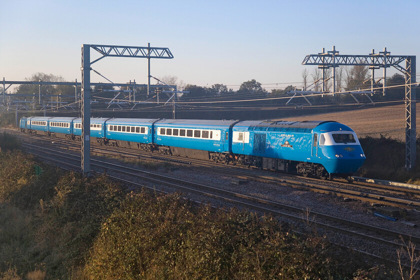 43058 & 43050, outward leg of The West Highland Pullman, 07.04 St. Albans-Fort William (1Z43, 2E), Harrowden Junction 
 Looking superb in the early morning autumn sunshine LSL's Midland Pullman HST set passes Harrowden Junction having just left Wellingborough station. Power car 43058 'Loch Eil' is leading with 43050 'Loch Morar' bringing up the rear working the outward leg of The West Highland Pullman that left St. Albans at 07.04 heading for Fort William. Incidentally, train planners gave it the reporting number of 1Z43 in a nod to the class of power cars; a nice touch! 
 Keywords: 43058 43050, outward leg of The West Highland Pullman, 07.04 St. Albans-Fort William 1Z43 Harrowden Junction Bue Pullman HST LSL Midland Pullman Loch Eil Loch Morar