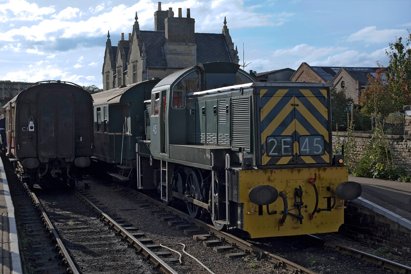 9520, 15.22 Wansford-Peterborough Nene Valley (2E53), Wansford station 
 Teddybear 9520 had a criminally short career with British Railways of just four years (1964-1968)! It then spent many more years in industrial use with Northamptonshire iron ore mining company Stewart & Lloyds initially at Glendon Quarry between Kettering and Corby. With their excellent vision front and rear due to the raised cab, they were very useful locomotives for such work. Now in its preservation era, 9520 leaves Wansford station with the 15.22 diesel gala service to Peterborough Nene Valley. 
 Keywords: 9520 15.22 Wansford-Peterborough Nene Valley 2E53 Wansford station Teddy bear Class 14