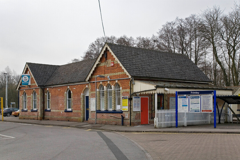 Frontage, Frimley station 
 Frimley station is an attractive symmetrically constructed building that was opened in 1877 by the London and South Western Railway. During off-peak hours it is served by a regular service operating between Ascot and Aldershot but it also enjoys peak-time direct services to and from Waterloo. 
 Keywords: Frontage Frimley station