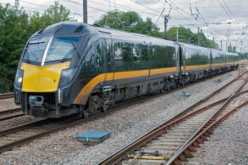 180107, 08.29 Sunderland-London King's Cross (1A61, 4E), Tallington 
 180107 'Hart of the North' speeds down Stoke Bank working the 08.29 Sunderland to King's Cross Grand Central service. The train has been descending for fifteen miles since leaving Stoke tunnel on an essentially straight track, this was, of course, the section of line that 'Mallard' reached its record-breaking one hundred and twenty-six miles per hour on in July 1938. 
 Keywords: Hart of the North 180107, 08.29 Sunderland-London King's Cross (1A61, 4E), Tallington Grand Central