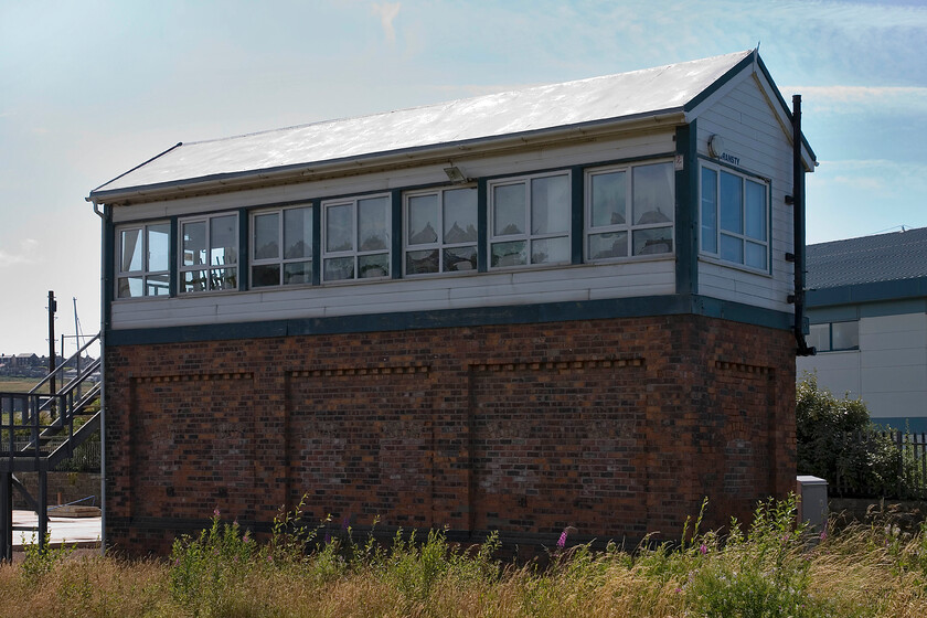 Bransty signal box (LNW, 1899) 
 Unfortunately, very badly back-lit Bransty signal box is seen in all of its LNWR glory. It was originally opened as Whitehaven Bransty in 1899 and then Barnasty No. 2 before reverting to Bransty in 1965 with the closure of No. 1 box. The box is the last LNWR box on the Cumbrian Coast route extending southwards from Carlise with the rest south from here being built by the Furness Railway. 
 Keywords: Bransty signal box LNWR1899