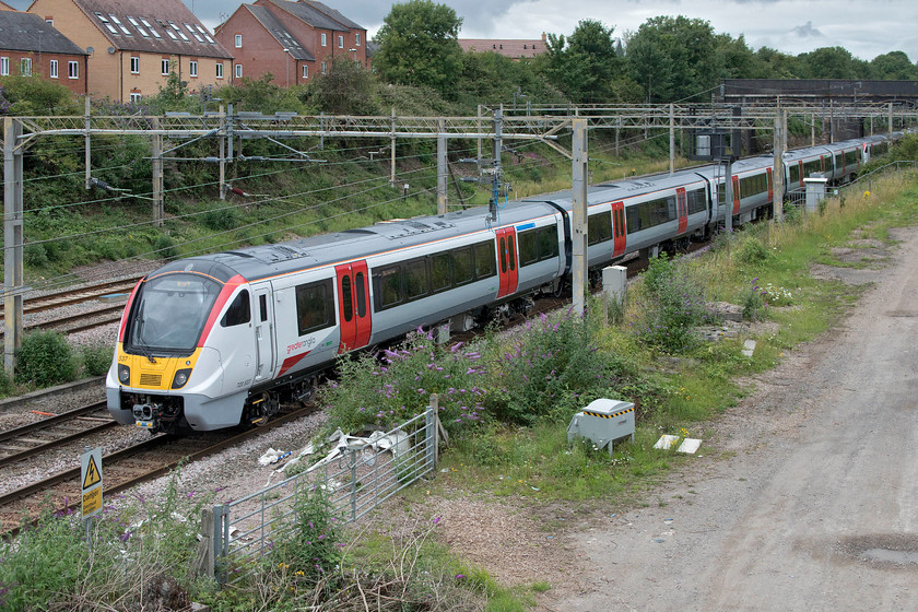 720537 & 720538, 12.38 Rugby-Wolverton centre sidings (5Q28, 7L), site of Roade station 
 Concurrently numbered 720537 and 720538 pass the site of Roade station with the early running 12.38 Rugby to Wolverton Works 5Q28 mileage accumulation run. I very nearly did not get this photograph and had it not been for my athletic prowess would have missed it! I was sitting at home having lunch, aware that this train was running and spotted that it had just left Northampton and was approaching Hunsbury tunnel. I grabbed the camera and ran to this spot switching the camera on and removing the lens cap as I approached the bridge for it to appear under the A508 bridge in the background. Without checking the settings, I pressed the shutter and managed this image! 
 Keywords: 720537 720538 12.38 Rugby-Wolverton centre sidings 5Q28 site of Roade station Greater Anglia GA Bombardier