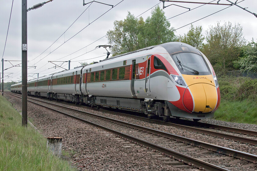 801102 & 801112, GR 09.30 London King's Cross-Edinburgh Waverley (1S10, RT), Penny's crossing SK630970 
 From this low angle, one cannot help to admire the design and the 'look' of the Hitachi Class 800 Azumas even more so in the red and white livery of the state-controlled and run LNER company. 801102 and 801112 head north past Penny's crossing near the village of Great Rossington (Doncaster) working the 1S10 09.30 King's Cross to Edinburgh service. 
 Keywords: 801102 801112 09.30 London King's Cross-Edinburgh Waverley 1S10 Penny's crossing SK630970 LNER Azuma