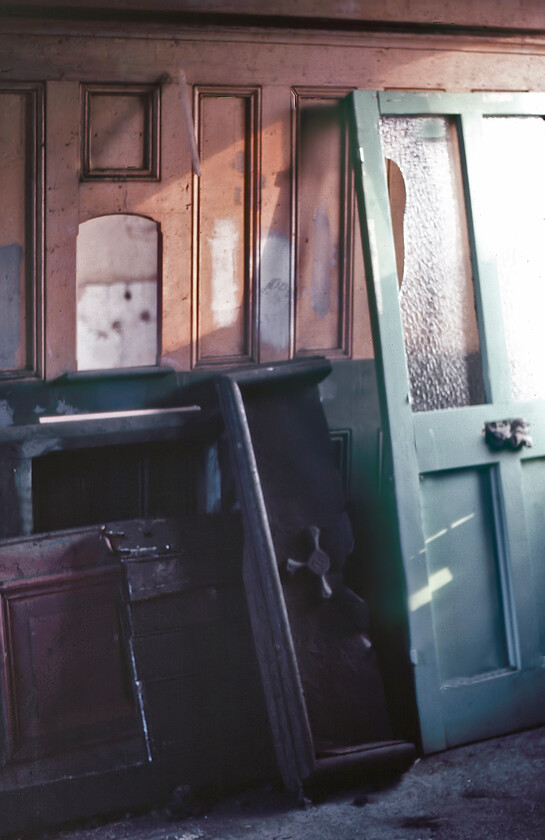 Closed ticket office, Cowbit station (closed 11.09.61) 
 Exploring Cowbits closed station Graham and I came across an open door. Feeling it rude not to have a snoop around we went in and discovered it relatively intact from when it closed almost exactly twenty years earlier to the day. Just managing to utilise the late afternoon sunshine streaming in from the outside I managed this atmospheric photograph of the ticket office. Today the station is a private residence the same as a number of other former railway buildings on the nineteen-mile stretch of the former GN/GE Joint line between March and Spalding. 
 Keywords: Closed ticket office Cowbitt station closed 11.09.61