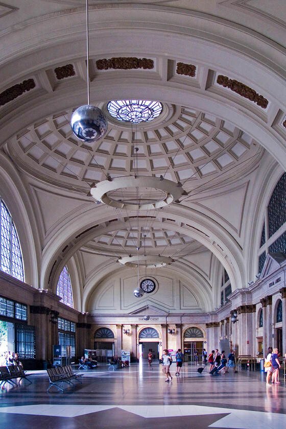 Concourse, Barcelona Frana station 
 For the early evening, the concourse at Barcelona's Frana station is surprisingly quiet. The impressive marble domes are more akin to a church than a railway station. It displays a mixture of classical and more modern architectural styles that underwent a huge renovation in 1992 to coincide with Barcelona hosting the Olympics. 
 Keywords: Concourse Barcelona Frana station