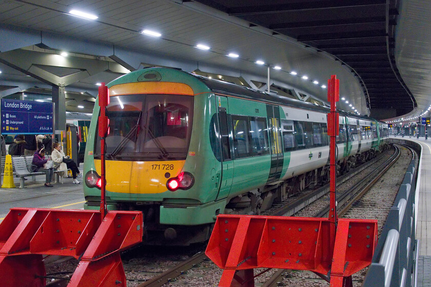 171728, SO 18.07 London Bridge-Uckfield (1E41, 8L), London Bridge station 
 London Bridge station has become a very busy and important hub and interchange just south of the River Thames. At its peak in 2019, it handled nearly seventy-five million passengers but the COVID effect slashed this figure with it now running at just over over a half of its pre-pandemic figure. Whilst it was certainly busy on this Tuesday evening it was not as packed as one would suspect. 171728 will depart soon with the 18.07 1E41 service to Uckfield that remains diesel-operated due to the third rail ending at Oxted with no immediate chance of it being installed beyond there. Services to and from Uckfield remain the only ones operated by diesel in and out from London Bridge. 
 Keywords: 171728 18.07 London Bridge-Uckfield 1E41 London Bridge station SouthernTurbostar