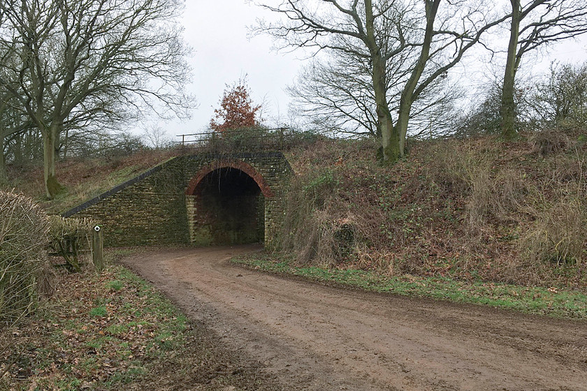 Former SMJR bridge, Easton Neston SP712504 
 A nicely constructed bridge that carried the former Stratford-upon-Avon and Midland Junction Railway (SMJR) over a bridleway in the grounds of Easton Neston Park. This section of the line that went from Towcester to Ravenstone Junction was closed in 1964. However, it was used for storage of redundant stock for several years prior to its eventual disposal. 
 Keywords: Former SMJR bridge Easton Neston SP712504 Stratford-upon-Avon and Midland Junction Railway