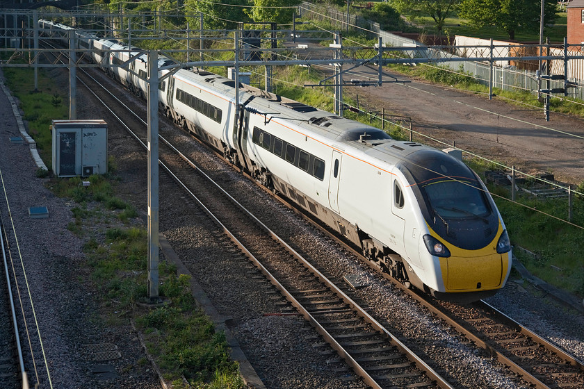 390134, VT 16.56 Wolverhampton-London Euston (1B56, 1E), site of Roade station 
 With the fast lines still closed (now approaching the third week) 390134 'City of Carlisle' passes the site of Roade station working the 16.56 Wolverhampton to Euston. Along with other operators, Avanti West Coast recast its timetable towards the end of March due to the COVID-19 travel restrictions only to do the same exercise again to take account of the prolonged closure of the Weedon line. 
 Keywords: 390134 16.56 Wolverhampton-London Euston 1B56 site of Roade station City of Carlisle Avanti West Coast Pendolino Virgin