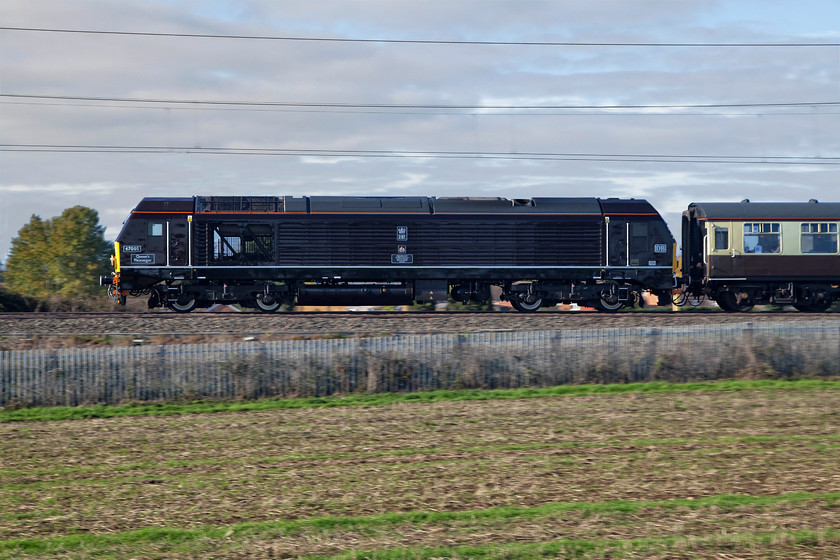 67005, outward leg of The Blackpool Illuminations-Pride of the North! 09.00 London Euston-Blackpool North (1Z78), Milton Malsor SP740557 
 Dedicated royal locomotive 67005 'Queen's Messenger' brings up the rear of the 'The Blackpool Illuminations-Pride of the North!' excursion that left Euston at 09.00. It would return much later having given the passengers a chance to enjoy the world famous Blackpool Illuminations that only had one day to go before being switched off for the season. The train is seen passing Milton Malsor just south of Northampton. 
 Keywords: 67005 outward leg of The Blackpool Illuminations-Pride of the North! 09.00 London Euston-Blackpool North 1Z78 Milton Malsor SP740557