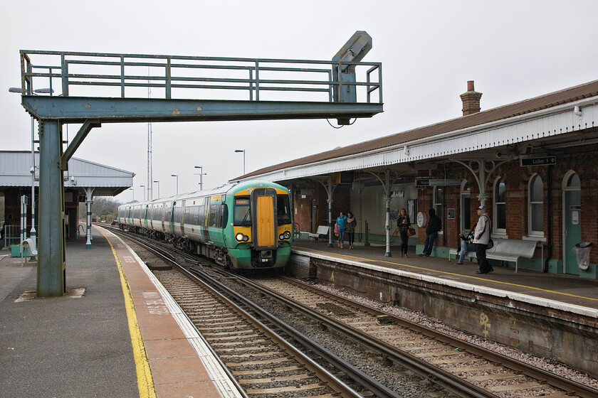 377405, SN 15.33 Southampton Central-Brighton, Ford station 
 Like Barnham station, a short distance to the west, Ford is also a busy one and at a junction where a branch line heads off the short distance to the south, this time to Littlehampton. However, to me it did not have quite the traditional 'country junction' feel of Barnham. 377405 arrives at Ford working Southern's 15.33 Southampton to Brighton 'Coastway' service 
 Keywords: 377405 15.33 Southampton Central-Brighton Ford station Southern Electrostar