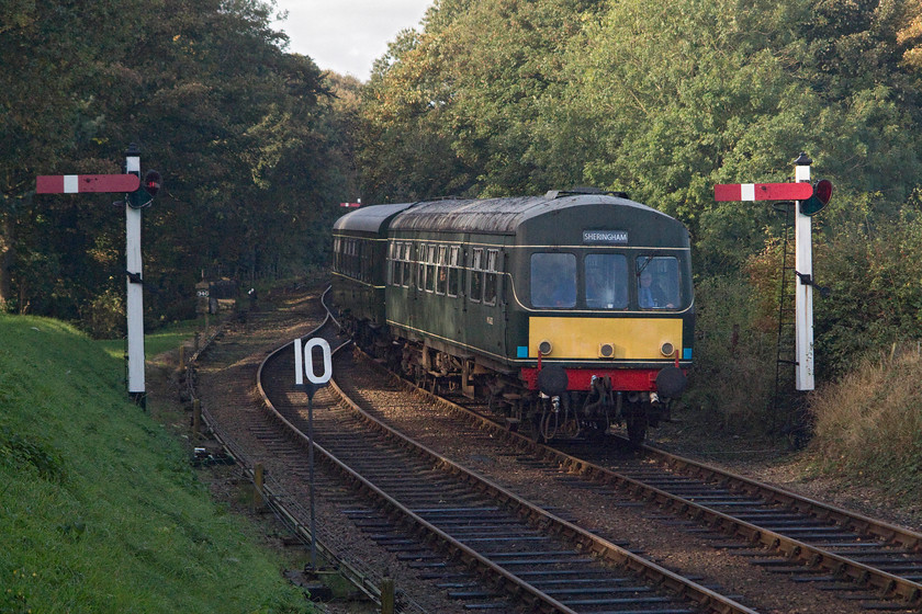 M56352 & M51192, 10.35 Holt-Sheringham, Weybourne 
 In lovely warm autumnal light, one of the North Norfolk Railway's class 101 DMUs, M56352 and M51192 arrive at Weybourne working the 10.35 from Holt to Sheringham. Generally, I am not a fan of this time of year, but, in terms of photography, it does produce the best quality of light that can contribute to some lovely pictures. 
 Keywords: M56352 M51192 10.35 Holt-Sheringham Weybourne