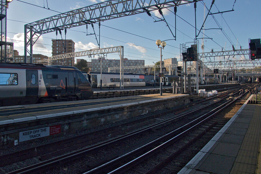 London Euston station 
 A view of Euston station that will look very different in a few years. With much work already having been undertaken the scene will be dominated by the HS2 departure and arrival platforms enclosed within a grand new shiny station. In the foreground, a soon-to-disappear (from the WCML route that is) Voyager sits with a Class 390 Pendolino in the background. 
 Keywords: London Euston station