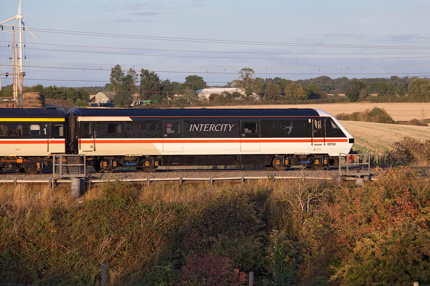 82139, 17.42 London Euston-Manchester Piccadilly (1Z41, 2E), Roade hill 
 With 90001 'Royal Scot' leading at the front of the train DVT 82139 is seen hanging on at the rear passing between Roade and Ashton in south Northamptonshire. The superb retro. set of Intercity stock and DVT (also with 90001 at the front) is working the 17.42 Euton to Manchester 1Z41 relief service makes a fine sight passing through the rural landscape! 
 Keywords: 82139 17.42 London Euston-Manchester Piccadilly 1Z41 Roade hill LSL Intercity Swallow DVT