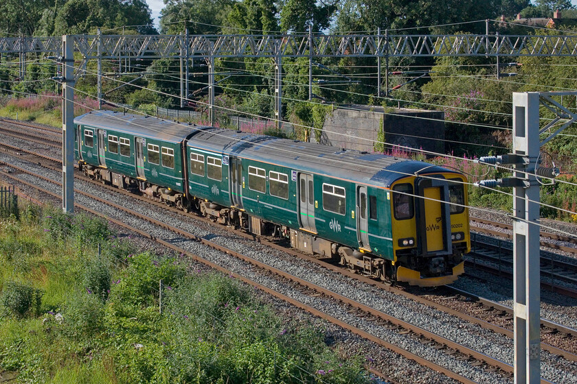 150202, 07.44 Wolverton Centre Sidings-Exeter St. David's MPD (5Z50, 6L), site of Roade station 
 I am not sure as to what work Gemini Rail Services UK Limited at Wolverton Works has been undertaking but having been completed 150202 is seen returning home passing Roade a short distance after leaving. The GWR unit was running as 5Z50 and rather unusually was returning to Exeter St. David's via Birmingham and then the Midland route via Cheltenham and Bristol rather than the more direct route south and then the GWML. 
 Keywords: 150202 07.44 Wolverton Centre Sidings-Exeter St. David's MPD 5Z50 site of Roade station GWR Great Western Railway