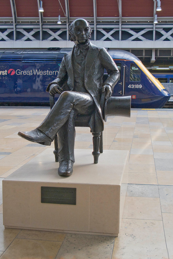 43189, GW 08.45 London Paddington-Swansea (1B15) & IKB statue, London Paddington station 
 Isambard Kingdom Brunel has his back to both the station that he designed and one of the most iconic trains ever built, should he not be facing them? 43189 'Railway Heritage Trust' will soon leave with the 08.45 to Swansea from platform one. I suspect that Brunel will need to be moved as this area of the station is where the Crossrail platforms will be, perhaps the opportunity could be taken to then move him to a better position within the station, perhaps taking pride of place on the concourse? 
 Keywords: 43189 08.45 London Paddington-Swansea 1B15 IKB statue London Paddington station Brunel First Great Western HST Railway Heritage Trust