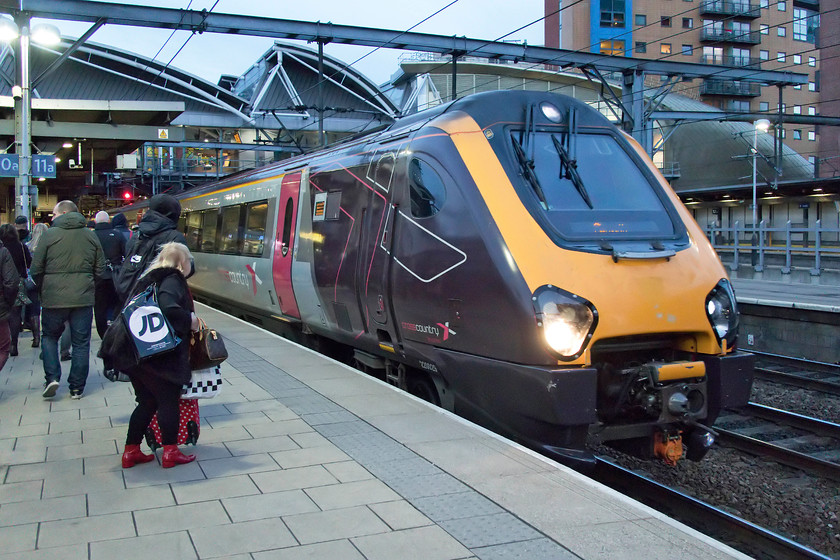 220029, XC 15.08 Glasgow Central-Plymouth (1V68, 4L), Leeds station 
 Our train back to Birmingham New Street arrives into Leeds station. 222029 is working the 15.08 Glasgow Central to Plymouth. The service was extremely full here at Leeds with virtually no adherence to the reservations taking place! As the journey progressed it thinned out and we managed to secure a four seat table to ourselves. I made excellent use of CrossCountry's Wifi that worked for the whole journey and enabled me to work on this web site. However, the ride of the train was particularly bad on the section of line between Chesterfield and Derby with the train pitching and swaying alarmingly at times. It made it tricky for me to type on the laptop and induced some mild nausea! Just a further aside, the courteous and informative guard announced several times that there were no refreshments available on the train. On an inter-regioanl train of this nature, this was a very poor show. 
 Keywords: 220029 15.08 Glasgow Central-Plymouth 1V68 Leeds station