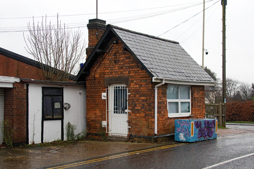 2. Former weighbridge office, Syston station 
 Syston station opened in 1840 to be rebuilt in 1874 when the track was quadrupled. It was closed by British Rail in March 1968 with the attractive station building removed brick by brick and rebuilt at the Butterley Midland Railway Centre. After a protracted campaign, the station was reopened in 1994 as part of the Ivanhoe Line project. The only remnant of the original station appears to be the weighbridge seen at the station entrance road. It appears to have present-day use as some sort of office. 
 Keywords: Former weighbridge office Syston station