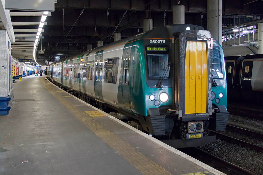 350376, LN 12.23 London Euston-Birmingham New Street (1Y35, RT), London Euston station 
 Keywords: 350376 12.23 London Euston-Birmingham New Street 1Y35 London Euston station London Northwestern Desiro Our train home from London to Northampton stands inside Euston station. 350376 and another desiro will soon whisk us away as the 12.23 Euston to Birmingham New Street service. Unlike the outward journey two days previously there were no dramas on this return run!