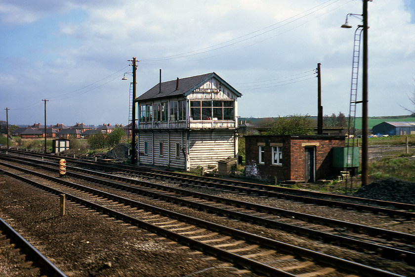 Kilnhurst South Signal Box (GC, date not known) 
 I can find out very little information about Kilnhurst South Junction signal box. It is a classic Great Central structure, but its date of construction is unknown but I would think that it would be sometime during the early twentieth century. It was located just north of Rotherham near to Rawmarsh. Notice the three disc shunting signals arranged in a vertical manner due to spacing issues between the running lines. Any information about this box would be greatly appreciated. 
 Keywords: Kilnhurst South Signal Box (GC, date U/K)