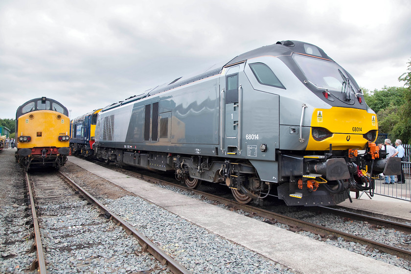 37069, 20302 & 68014, on-display, DRS Open Day, Gresty Bridge 
 Over fifty years separate the English Electric classes and the class 68 seen in this image taken at the DRS Gresty Bridge Open Day. 68014 is seen in its Chiltern Railways livery as it is leased to them to operate their Marylebone to West Midlands trains by DRS. 37069 and 20302 are used by DRS but for far more mundane tasks such as autumn leaf busting or the occasional nuclear flask working. 
 Keywords: 37069 20302 68014 DRS Open Day Gresty Bridge