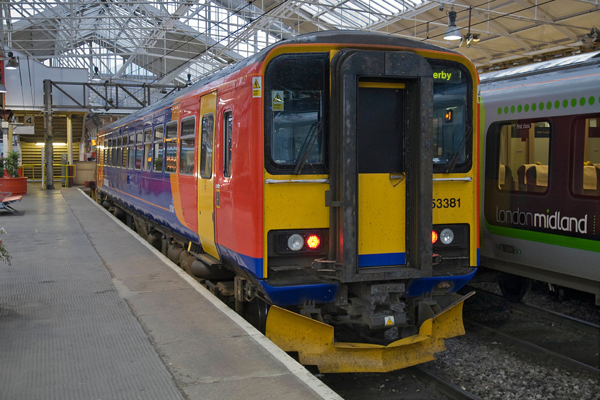 153381, EM 20.45 Crewe-Derby (1K28), Crewe station 
 Single-car 153381 will work the 20.45 1K28 to Derby later in the evening. The unit is seen at Crewe's platform four in the gathering gloom of this mid-August evening. 
 Keywords: 153381 20.45 Crewe-Derby 1K28 Crewe station East Midlands Trains EMT