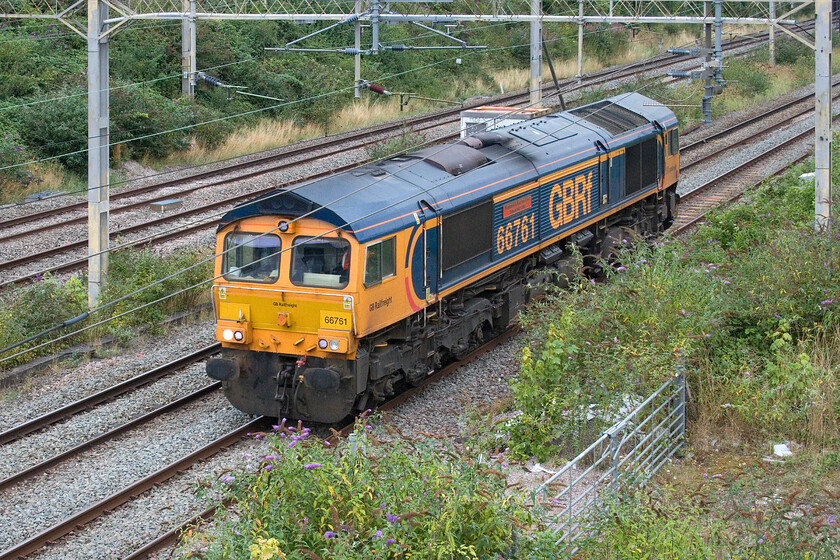 66761, 16.05 Litchfield TV sidings-Dagenham Docks (cancelled from Wembley Yard) (0Z43, 1L), site of Roade station 
 Perhaps on some sort of GBRf Thunderbird rescue run, 66761 'Wensleydale Railway Association 25 years 1990-2015' passes through Roade as the 16.05 Litchfield TV to Dagenham Docks light engine move running as 0Z43. However, it appears that its services at Dagenham were perhaps not needed as this run was terminated in Wembley Yard. 
 Keywords: 66761 16.05 Lichfield TV sidings-Dagenham Docks cancelled from Wembley Yard 0Z43 site of Roade station Wensleydale Railway Association 25 years 1990-2015