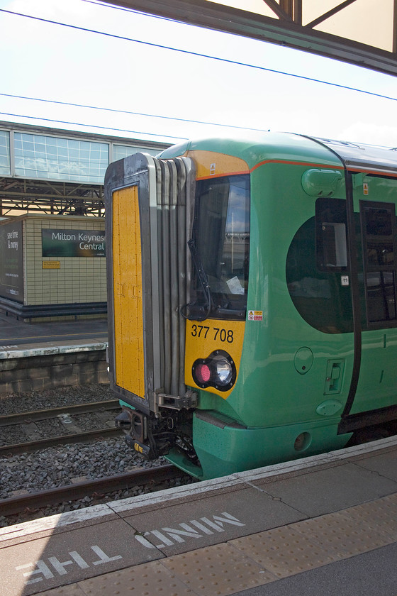 377708, SN 17.13 Milton Keynes Central-East Croydon (2O59), Milton Keynes Central station 
 377708 waits at Milton Keynes to work the 17.13 to East Croydon. My wife son and I took this train to Kensington Olympia. I like these Electrostars, I find their interiors airy and comfortable. This particular sub-set (377/8), of which there are eight units, are for dual voltage operation solely on this route. They transfer from AC to DC operation (and vice versa) during a brief pause in the journey just south of North Pole Junction. 
 Keywords: 377708 17.13 Milton Keynes Central-East Croydon 2O59 Milton Keynes Central station