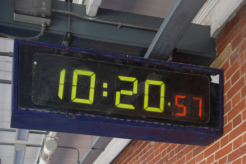 Click-clack clock, Stansted Mountfitchet station 
 Variously referred to as click-clack or flip clocks these fine pieces of eighties technology were once found all over Network SouthEast route's stations. With their distinctive sound, they kept the travelling public informed of the time accurately wherever they may have been. I believe that there are just six left in operation with this being one of them at Stansted Mountfitchet on the up platform. Whilst this example has lost its NSE branding and colouring it is still faithfully keeping time! The last examples that I photographed were back at Liverpool Street in 2019, see.... https://www.ontheupfast.com/p/21936chg/26206737404/x90006-13-30-london-liverpool-street and before that at Victoria station during 2015, see.... https://www.ontheupfast.com/p/21936chg/28842982404/x465047-11-36-orpington-london-victoria I believe that both of these have now been removed. 
 Keywords: Click-clack clock Stansted Mountfitchet station flip clock Network Southeast