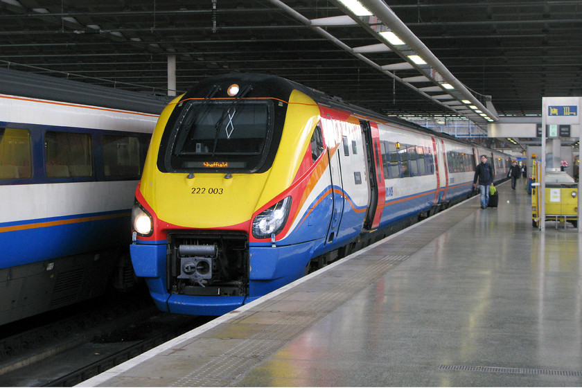 222003, EM 15.26 London St. Pancras-Sheffield (1F48), London St 
 222003 'Tornado' stands inside the gloomy interior of St. Pancras' Midland station. It will soon work the 'fast' 15.26 to Sheffield. It's a shame that the same amount of effort was not put into creating this particular part of the grand St. Pancras station as a whole, it's such a disappointment. 
 Keywords: 222003 15.26 London St. Pancras-Sheffield 1F48 London St. Pancras station