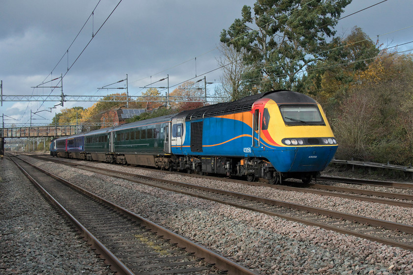 43058, 11.11 Carnforth-Rugby (5Z44, 8E), Cathiron SP4667783 
 LSL at Crewe has taken a very bold move given the uncertain times that we are currently living in to invest in the charter market. Not only that but it has taken advantage of the dearth of HSTs that have come off lease and that are begging for new keepers. Here one of their hybrid sets approaches Carithon on a test run from Crewe to Carnforth (5Z43) and then south to Rugby as 5Z44. It is being led by former EMR 43058 that I have seen many times on the MML over the years, most recently at Wellingborough back in pre-covid times in February, see.... https://www.ontheupfast.com/p/21936chg/28700325004/x43058-11-45-nottingham-london-st It is leading four former GWR first-class Mk.3s with the leading two in their most recent house green colour with the trailing two in FGW's older livery. Another former EMR power car brings up the rear in the form of 43059. When new in the autumn of 1977 the two power cars commenced their working career as a pair at either end of set 254002 storming up and down the ECML probably cursed by me as a young spotter as they ousted the Deltics! 
 Keywords: 43058 11.11 Carnforth-Rugby 5Z44 Cathiron SP4667783 HST EMT GWR East East Midlands Railway