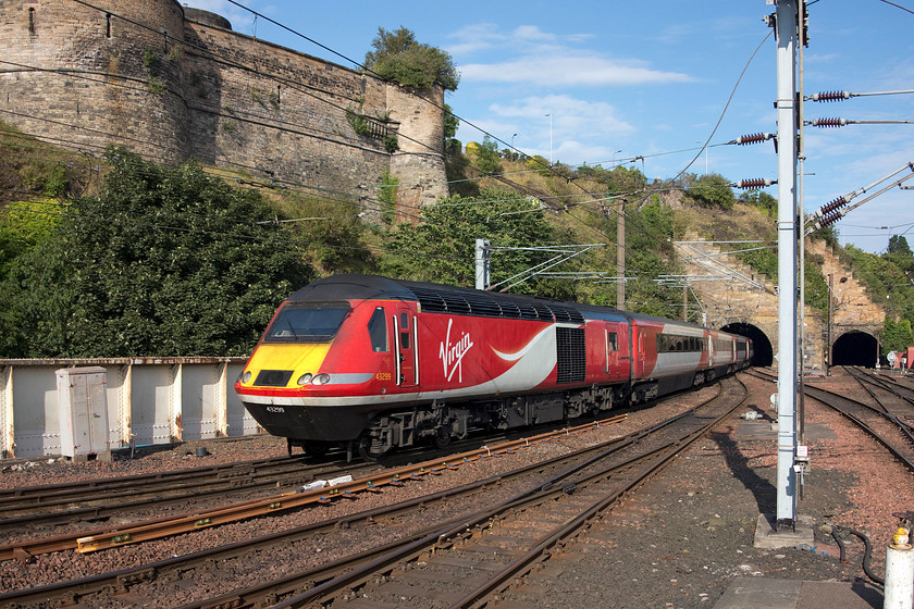 43299, GR 13.47 Aberdeen-London King s Cross (1E23), Edinburgh Waverley station 
 In lovely late summer light, 43299 brings up the rear of the 13.47 Aberdeen to King's Cross as it leaves Edinburgh Waverley station taken from the end of the very long platform eleven/seven combination that I believe is now considerably over 300 metres. From the end of this platform, there is now a clear view of the single-bore Calton Tunnels that are a cause of congestion to the eastern end of the busy station. 
 Keywords: 43299 13.47 Aberdeen-London King's Cross 1E23 Edinburgh Waverley station