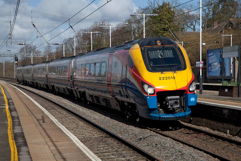 222010, EM 10.16 Corby-London St. Pancras (1P29, 2l), Flitwick station 
 East Midlands Trans 222010 passes Flitwick station at speed working the 10.16 Corby to London St. Pancras. Note, the non-standard number, slightly off-centre and in a larger font than the rest of the fleet. 
 Keywords: 222010 1P29 Flitwick station 10.16 Corby to London St. Pancras. Note, the non-standard number, slightly off centre and in a larger font than the rest of the fleet.