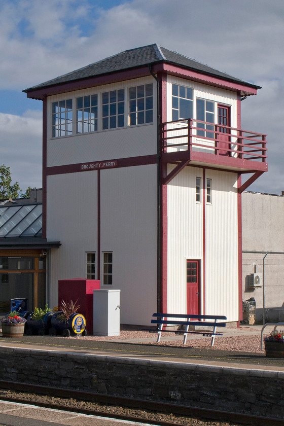 Broughty Ferry signal box (rebuilt) (Caledonian, 1887) 
 The rebuilt Broughty Ferry signal box looks very impressive relocated to the up platform at the station incorporated into a new restaurant. This makes a marked contrast to the situation fifteen years ago with a very run-down and dowdy station made all the more concerning as it was the oldest station in Scotland still in use, dating from 1838. The signal box is a Caledonian box built in 1887 and was very unusual as it was of a bespoke timber construction. Part of the reason for this was that it had part of the station footbridge passing through its base that must have made the arrangement of the frame room somewhat tricky! After proposals by Network Rail to demolish the station and box were, quite rightly, thrown out by the local council a new plan was devised to take a more sympathetic approach to the redevelopment of the site. One result of this was the dismantling of the box located at the down end of the northbound platform and its rebuilding on the southbound side as seen here. 
 Keywords: Broughty Ferry signal box Caledonian 1887