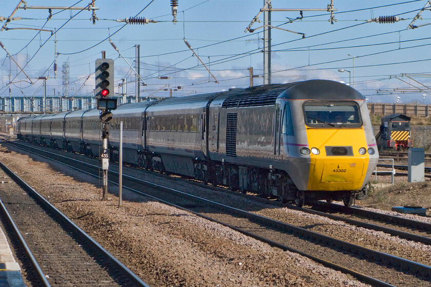 43302, GR 07.34 Harrogate-London King's Cross, Peterborough station 
 For me, the jury is out on East Coast's livery applied to their trains. I am aware that cost is an issue particularly as 'we', the taxpayers own the TOC as it is effectively a state-owned nationalised company. Perhaps it's better that money should be saved on fancy rebranding and painting with it spent more effectively on the quality of service. 43302 leads the 07.34 Harrogate to King's Cross HST service through Peterborough. 
 Keywords: 43302 07.34 Harrogate-London King's Cross Peterborough station HST