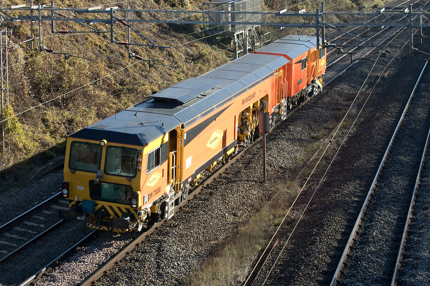 DR 73806, 11.45 Bletchley CS-Rugby, Victoria bridge 
 I had been tracking this working on RTT and correctly assumed that it was track machine returning to base after overnight engineering works and I was correct! Here, DR 73806 'Karine' passes Victoria bridge as the 11.45 Bletchley Carriage Sidings to Rugby. 
 Keywords: DR 78306 11.45 Bletchley CS-Rugby Victoria bridge