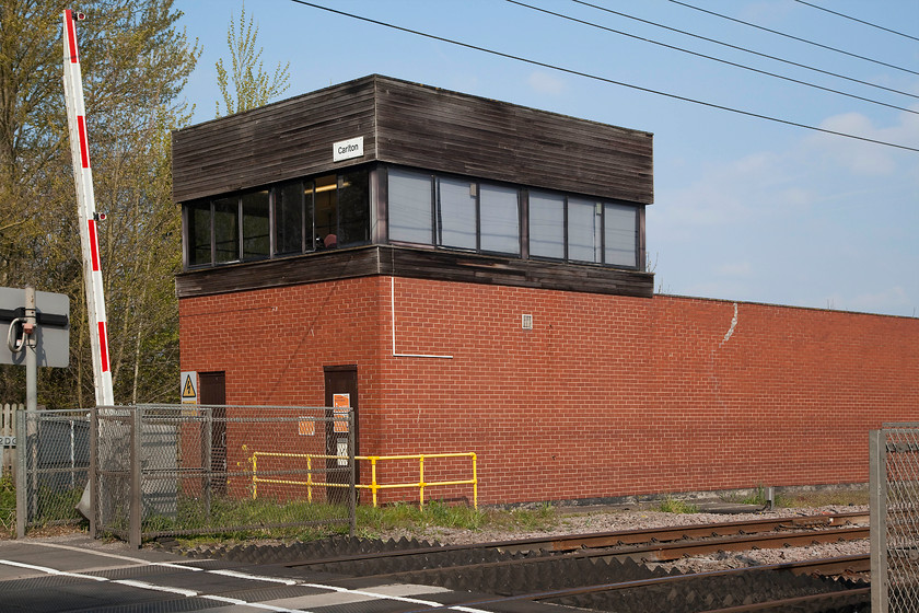 Carlton signal box (BR, 1976) 
 Carlton signal box is a BR structure dating from 1976 and is not a particularly attractive building! It is actually designated as a crossing box linked to Doncaster PSB. In the event of a systems failure it can take full control of the local interlocking over this section of line. It is is also used for staff training due to the fact that it can work independently if so needed. In fact, at the time we were here, there were a number of staff in the box so perhaps some sort of training was taking place. 
 Keywords: Carlton signal box (BR, 1976)