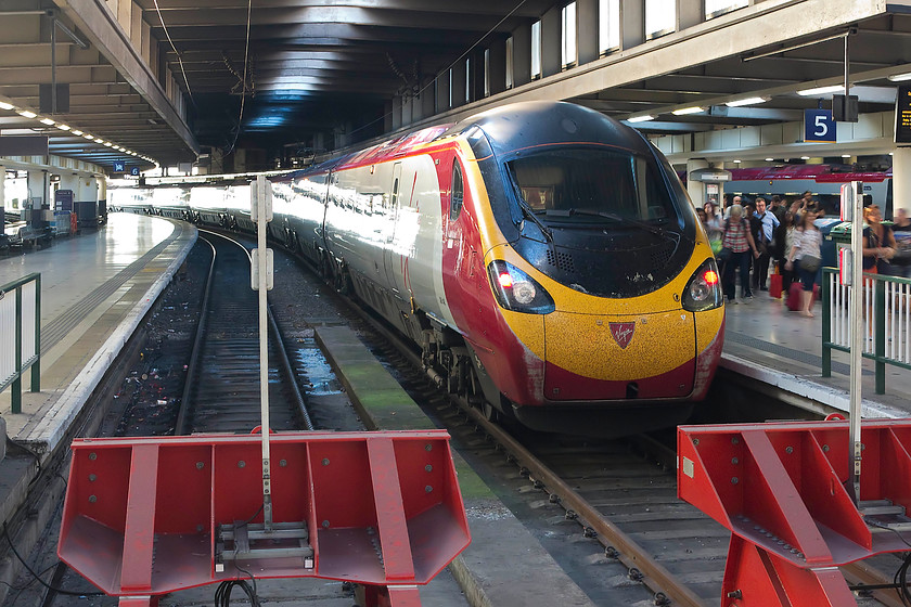 390148, VT 19.30 London Euston-Glasgow Central (1S06, 2L), London Euston station 
 390148 'Virgin Harrier' stands at Euston's platform five. It will work the last train of the day that works to Scotland, the 1S06 19.30 to Glasgow Central. 
 Keywords: 390148 1S06 London Euston station