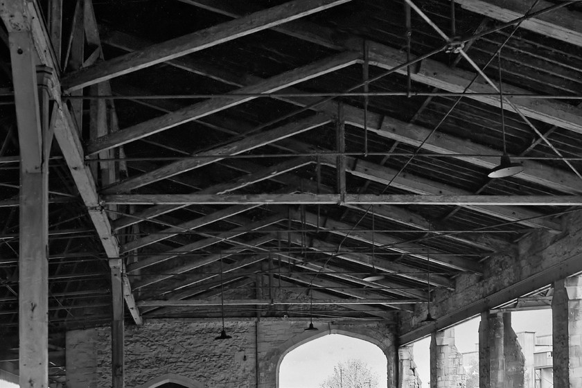 Roof, former Trowbridge goods shed 
 The underneath of the roof of Trowbridge goods shed some four years it was all torn down in an act of vandalism by BR just as arrangements were being made for it to be listed. The vaulted timber work and buttressed supporting walls are so ornate with the whole structure not looking out of place in a cathedral rather than a lowly good shed! 
 Keywords: Roof former Trowbridge goods shed