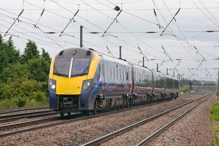 180109, HT 06.02 Beverley-London King`s Cross (1A91), Holme Green crossing TL192426 
 Hull Trains operate some HSTs and a number of Class 180 Adelante units that they inherited from First Great Western. These notoriously unreliable units are not well-liked with the simplicity of the HSTs prefered by crews. Thankfully going well and to time, 180109 heads south past Holme Green crossing with the 06.02 Beverley to King's Cross service. 
 Keywords: 180109 06.02 Beverley-London King`s Cross 1A91 Holme Green crossing TL192426 Hull Trains Adelante