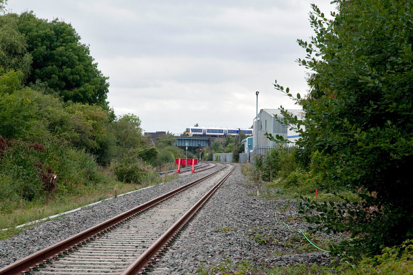 Class 16X, CH 15.10 London Marylebone-Birmingham Moor Street (1R41, RT), Jarvis Lane Crossing SP598228 
 Chiltern's 15.10 Marylebone to Birmingham Moor Street crosses the recently reinstated short section of the east-west rail link at Bicester. The picture is taken from Jarvis Lane foot crossing. I wonder if trains will thunder past this spot in a few years heading for Bletchley, Milton Keynes and beyond? 
 Keywords: Class 16X 1R41 Jarvis Lane Crossing SP598228